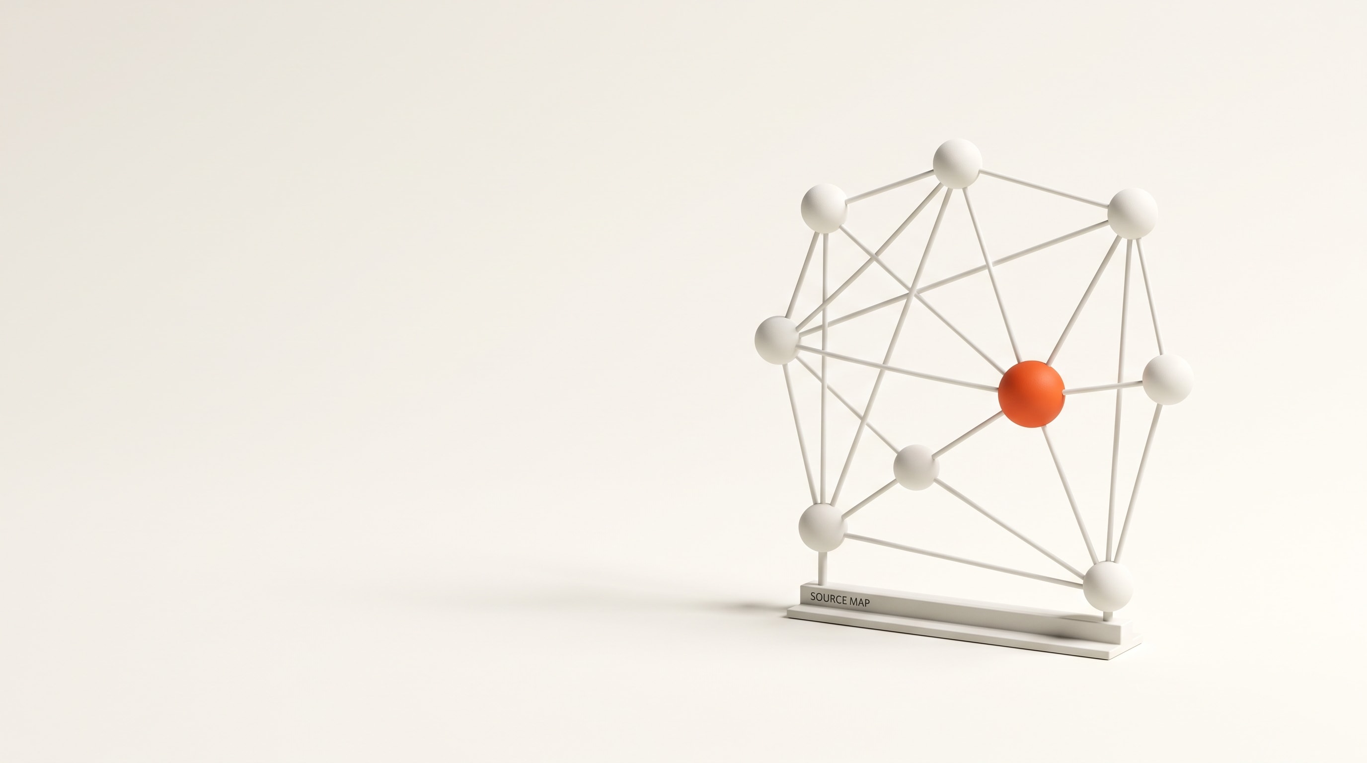 A standing network model of matte spheres joined by thin rods on a plinth reading SOURCE MAP, one sphere in signal orange